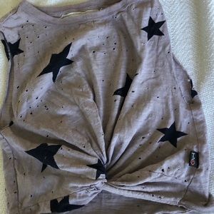 T2Love girls crop tank with stars ans holes. 6